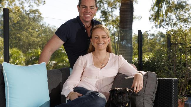Craig and Lara Lowndes with their dog Lola at their Brisbane home.