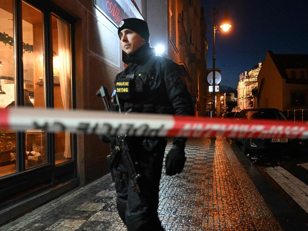 A police officer secures the area near the Charles University in central Prague. Picture: John MacDougall / AFP