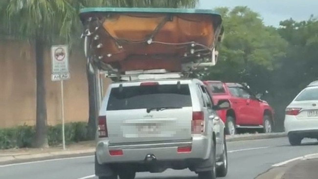 A driver has been filmed with a spa attached to their car roof. Picture: TikTok