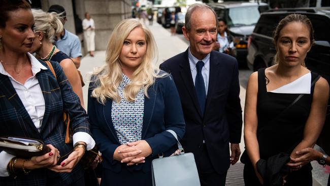 David Boies, representing several of Jeffrey Epstein's alleged victims, centre, arrives with Annie Farmer, right, and Virginia Giuffre, alleged victims of Jeffrey Epstein, second left. Picture: Bloomberg