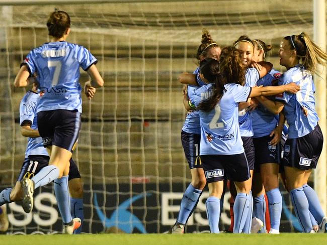 Caitlin Foord reacts after scoring for Sydney against the Wanderers during the round 1 W-League match between Western Sydney Wanderers and Sydney FC at Marconi Stadium, Sydney, Thursday, October  25, 2017. (AAP Image/Brendan Esposito) NO ARCHIVING, EDITORIAL USE ONLY