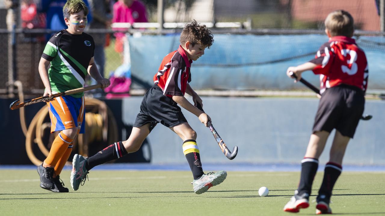 Past High captain Colten Hart (centre) against Newtown Norths Tigers in under-11 boys Presidents Cup hockey at Clyde Park, Saturday, May 27, 2023. Picture: Kevin Farmer