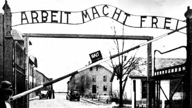 The entrance to the infamous Auschwitz camp after liberation in 1945. For Hitler, being Jewish wasn’t a crime of religion, it was a crime of the blood.