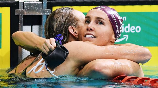 ADELAIDE, AUSTRALIA – JUNE 16: Madison Wilson hugs winner Emma McKeon after the Women's 100 metre Freestyle final during the Australian National Olympic Swimming Trials at SA Aquatic & Leisure Centre on June 16, 2021 in Adelaide, Australia. (Photo by Mark Brake/Getty Images)
