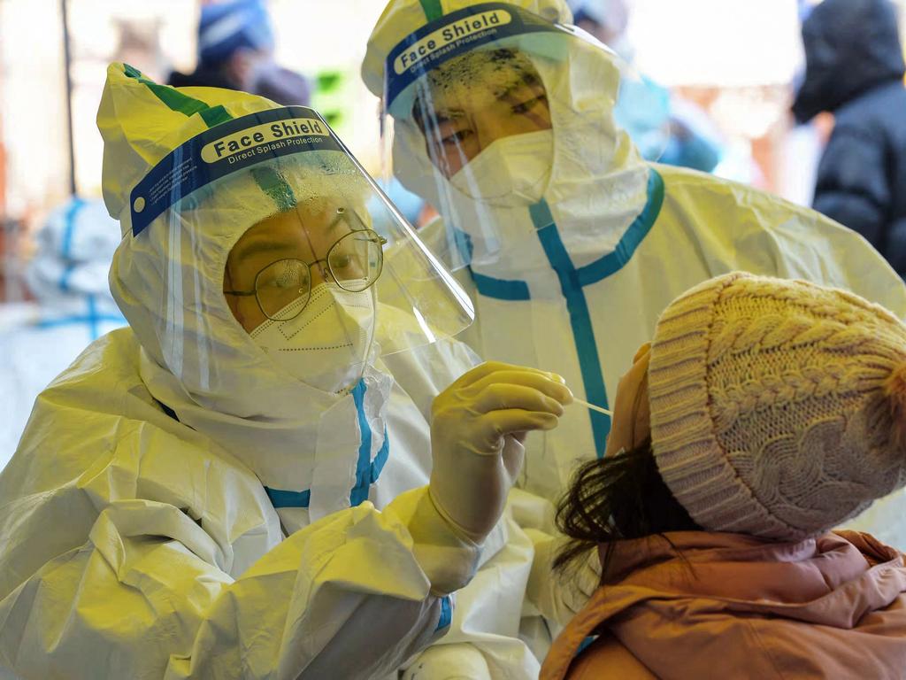 A residents undergoes a nucleic acid test for Covid-19 in north China's Tianjin on January 10, 2022. Picture: AFP / China OUT