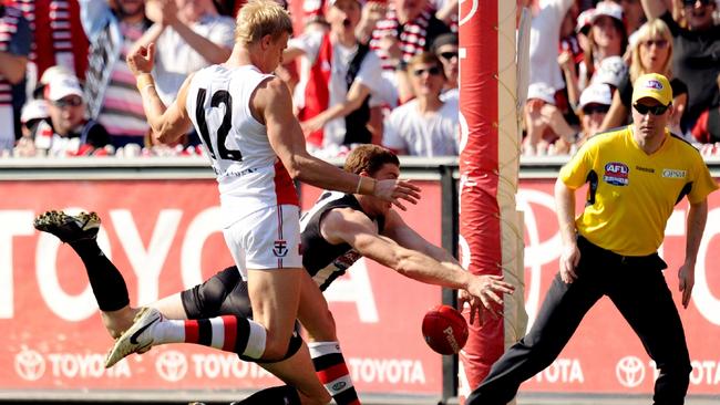 Heath Shaw completes a famous smother to stop Nic Riewoldt in the 2010 grand final replay.