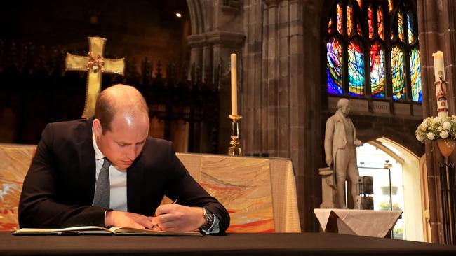 Prince William signs a book of condolences after meeting first aid responders and members of the community at Manchester cathedral who provided care and support to those affected by the June terror attack. Good samaritans in the city opened their homes for those displaced at the time.