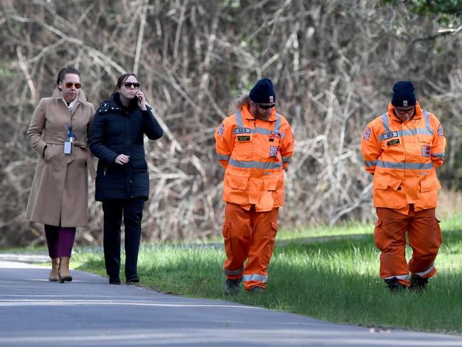 SES volunteers search around Childers Rd in Mt Macedon. Picture: AAP/Joe Castro