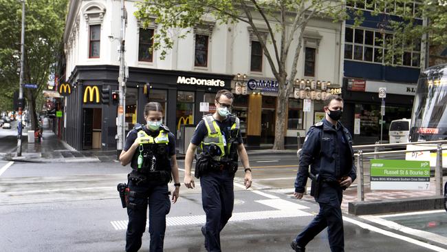 Police patrol the CBD on Tuesday during stage 4 restrictions in Melbourne. Picture: NCA NewsWire / David Geraghty