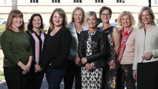 Sarah Lovell, Jo Siejka, Madeleine Ogilvie, Sarah Courtney, Elise Archer, Cassy O’Connor, Ruth Forrest and Rebecca White outside Parliament House in Hobart. Picture: SAM ROSEWARNE