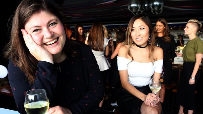 Gen George and Jane Lu - co-founders of 'Like Minded Bitches Drinking Wine' at their Christmas drinks party in Sydney. Picture: James Croucher