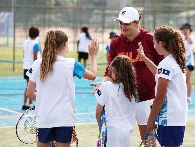 NEWCASTLE, AUSTRALIA - APRIL 06:  Ash Barty interacts with participants during the National Indigenous Tennis Carnival Launch District Park Tennis at on April 06, 2023 in Newcastle, Australia. (Photo by Matt King/Getty Images for Tennis Australia)