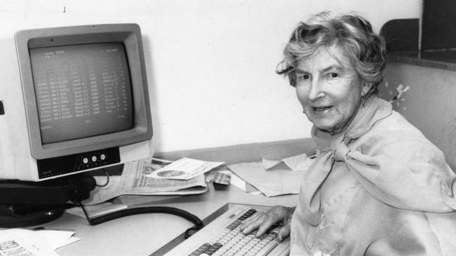 Celebrated writer and journalist Nancy Cato, 70, sitting at a computer in the editorial department of "The News" newspaper in Adelaide, 29 Sep 1987. She started her journalistic career as a cadet with "The News" in 1934.