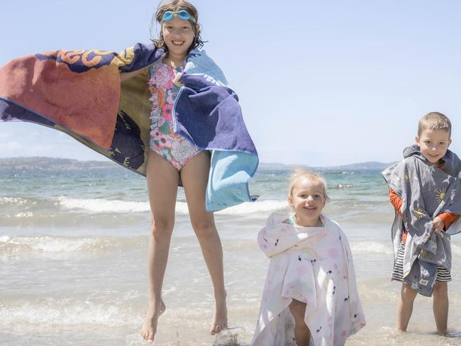 Monday hot weather - Piper Mayne 8, Billie Spencer 3 and Max Spencer 5 at Kingston Beach. Picture: Caroline Tan