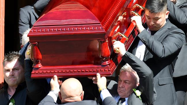 Funeral service for Karen Ristevski: Karen's brother Stephen Williams (left) and her husband Borce Ristevski (right) carry the coffin out of the church. Picture: Nicole Garmston