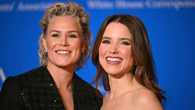 Harris (left) showed her support for her partner after she came out to the world. Picture: AFP