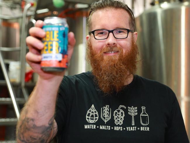 Brewer, Dan Shaw poses for photographs with the Sydney Beer Week's official beer in Rouse Hill. Rouse Hill, Friday, October 12th 2018. The Australian Brewery has created the official beer for Sydney Beer Week. (AAP Image / Angelo Velardo)