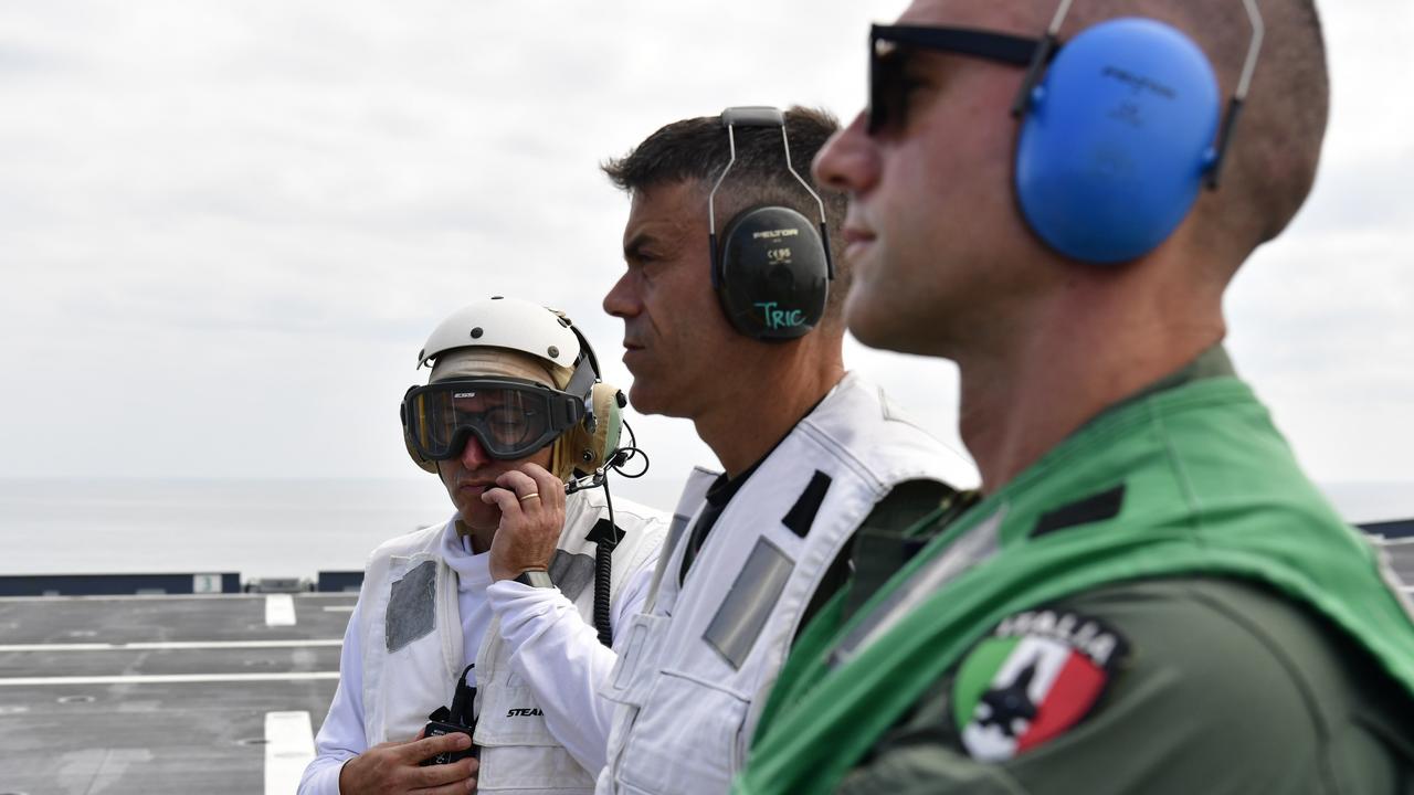 Landing deck staff monitor the airframes coming and going. Picture: Pema Tamang Pakhrin