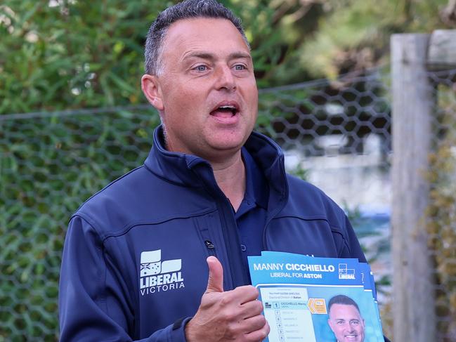 Liberal candidate Manny Cicchiello hands out flyers. Picture: Brendan Beckett