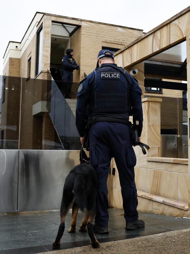 A firearm prohibition compliance check being carried out at the home of Omar Haourchar. Picture: Jonathan Ng