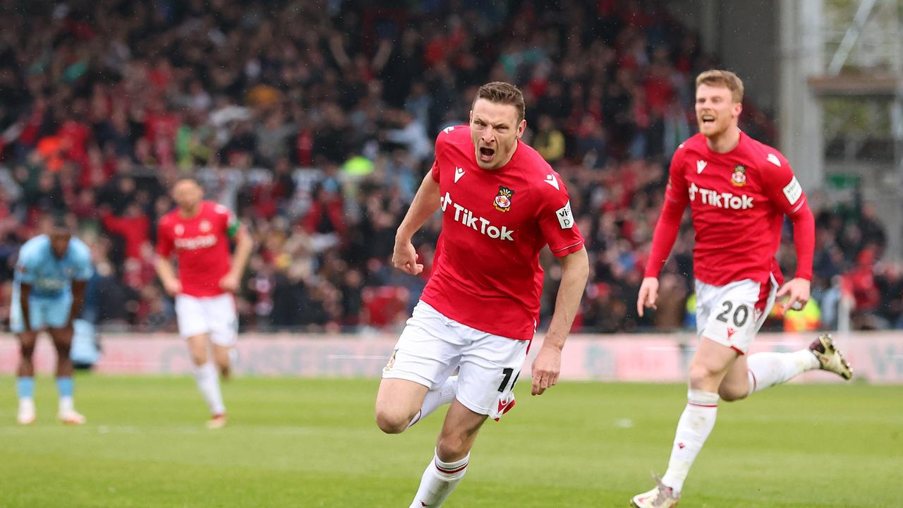 Paul Mullin of Wrexham celebrates after scoring. (Photo by Jan Kruger/Getty Images)