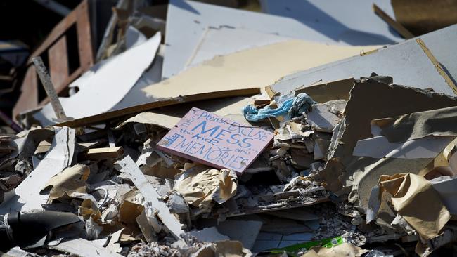 Piles of house contents destroyed in the Townsville floods lined the streets.