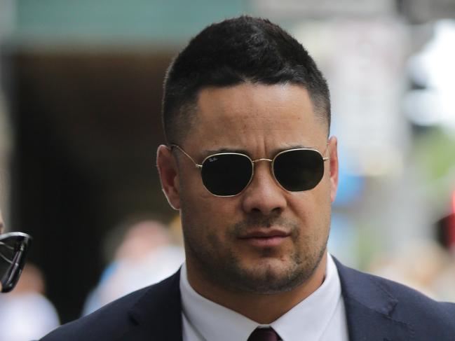 SYDNEY, AUSTRALIA - NewsWire Photos MARCH 18, 2021 - Former NRL superstar Jarryd Hayne leaving the Downing Centre in Sydney in company of his wife Amelia Bonnici and team of solicitors.Picture: NCA NewsWire / Christian Gilles