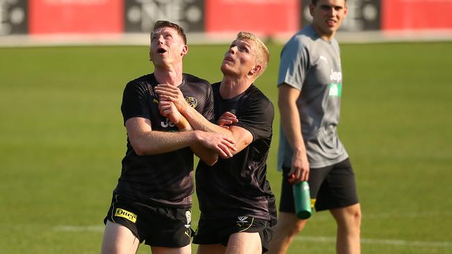 Dylan Grimes, left, and Ryan Garthwaite go head-to-head at Punt Road Oval. Picture: Mike Owen/AFL Photos