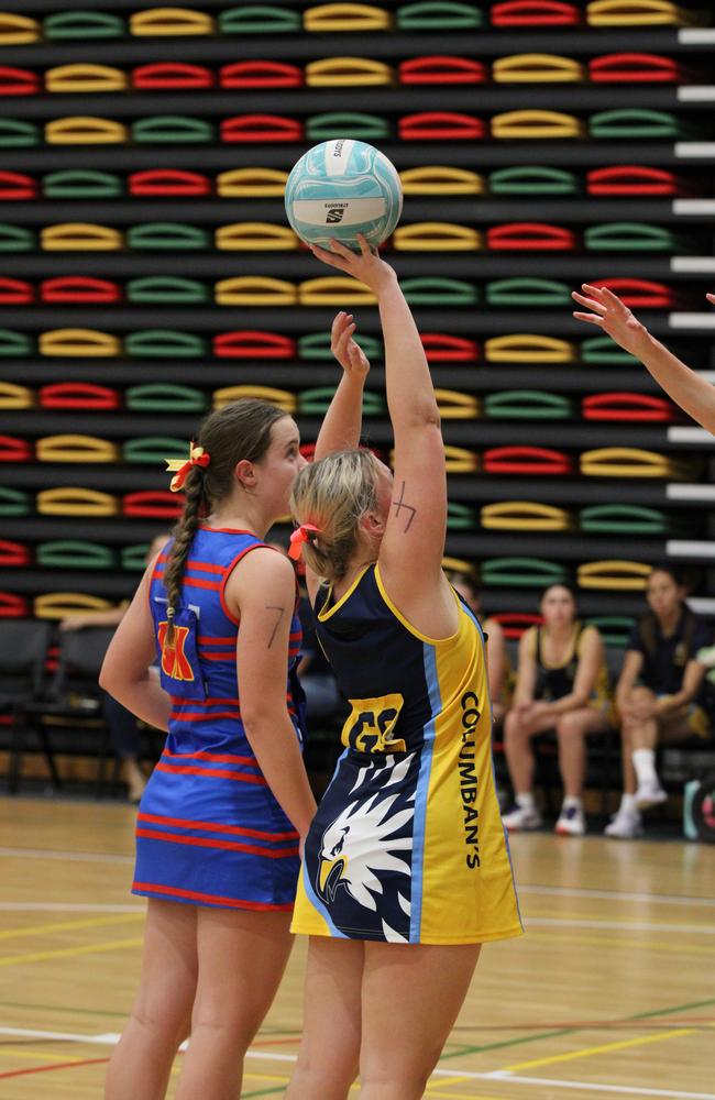 Netball action at QISSN 2024 held in Townsville. St Columbans College v Downlands College