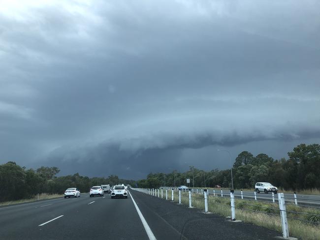 Storm clouds over the Bruce Highway Deception Bay. Pic: Liam Kidston