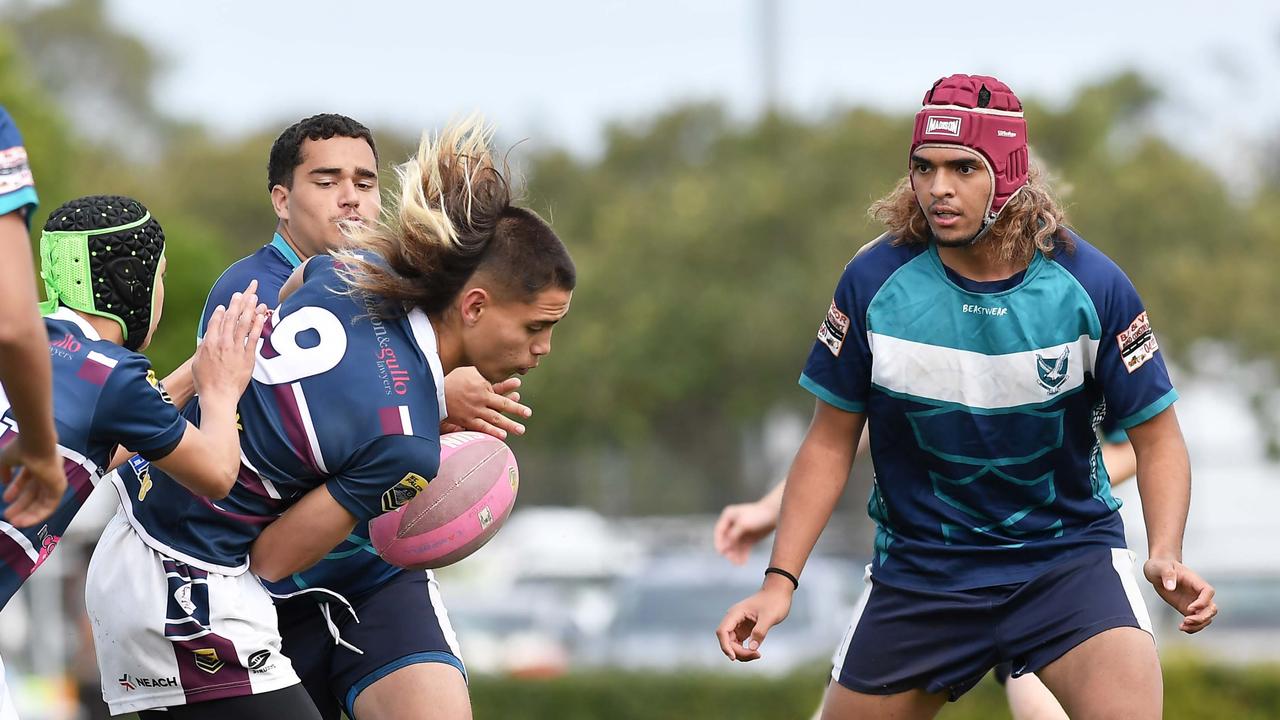 RUGBY LEAGUE: Justin Hodges and Chris Flannery 9s Gala Day. Mountain Creek State High (white shorts) V Morayfield State High, year 10. Creek's Nash Oliphant on the burst. Picture: Patrick Woods.