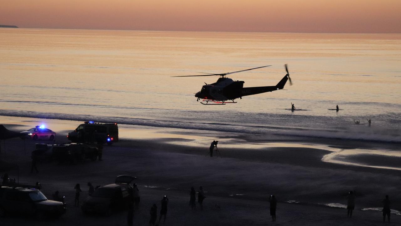 Ambulances and a rescue helicopter at Aldinga Beach earlier in January, where a woman was revived after nearly drowning. Ambulance officers will be under the pump again this Thursday. Picture: Leon Bignell 