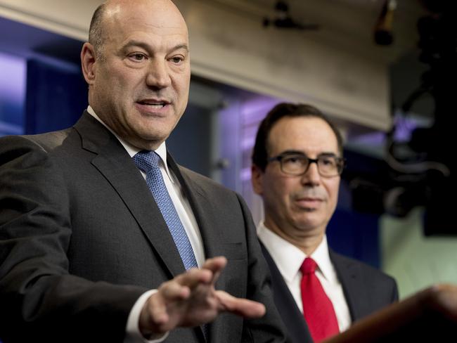 National Economic Director Gary Cohn, left, accompanied by Treasury Secretary Steve Mnuchin, speaks in the briefing room of the White House in Washington DC.  Picture:  AP