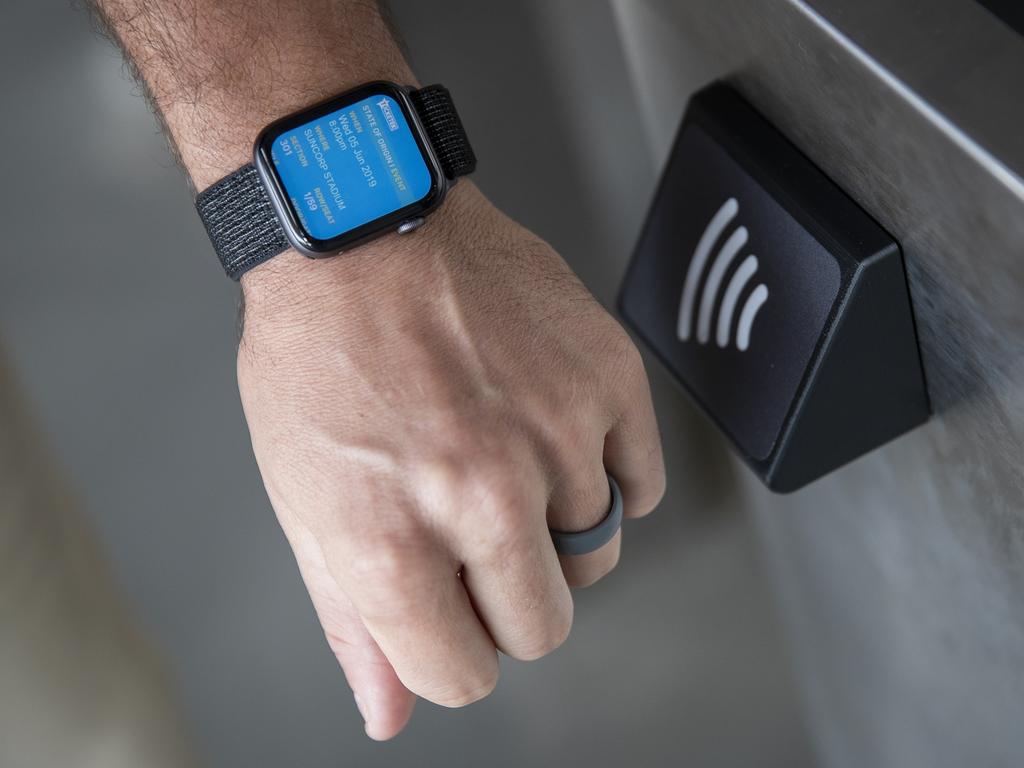 Brisbane rugby league player Matt Gillett tests Ticketek's new phone and smartwatch ticketing at Suncorp Stadium.