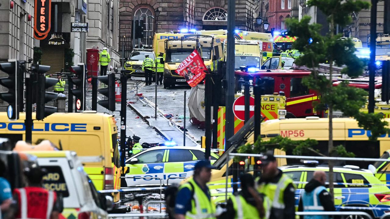 Child among 50 injured as man ploughs car into Liverpool fans
