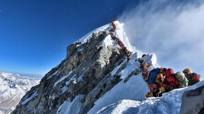 Climbers queue to reach the summit of Mount Everest. Picture: @nimsdai Project Possible / AFP