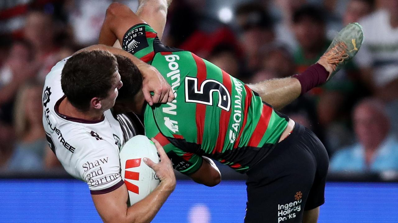 That’s how it is done – Fletcher Myers of the Sea Eagles is tackled by Marsden SHS alumni Leon Te Hau, now with the Rabbitohs. (Photo by Jason McCawley/Getty Images)