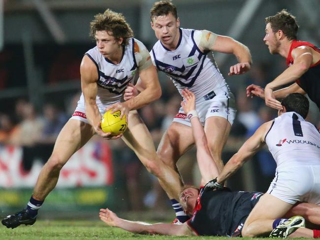 Nathan Fyfe holds possession against Melbourne. Picture: Scott Barbour