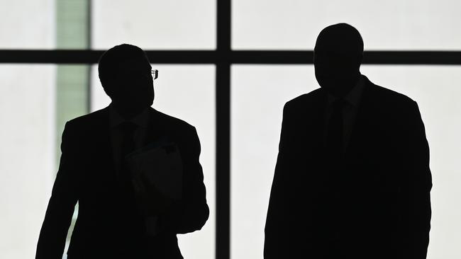 Julian Leeser, left, and Peter Dutton walk to a meeting with the Referendum Working Group meeting in Canberra. Picture: NCA NewsWire / Martin Ollman