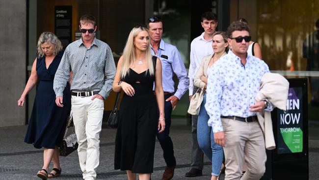 The family of Michelle Wolff, including her husband Gavin (centre), son Kobi (left), daughters Jacinda Collins (centre-left) and Kasey (centre-right) leave the Supreme Court after Johnston was sentenced to 11 years’ jail. Picture: NCA NewsWire