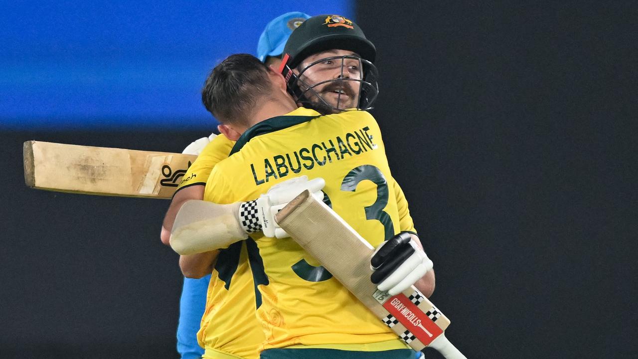 Travis and Marnus go down in history. Photo by Sajjad HUSSAIN / AFP
