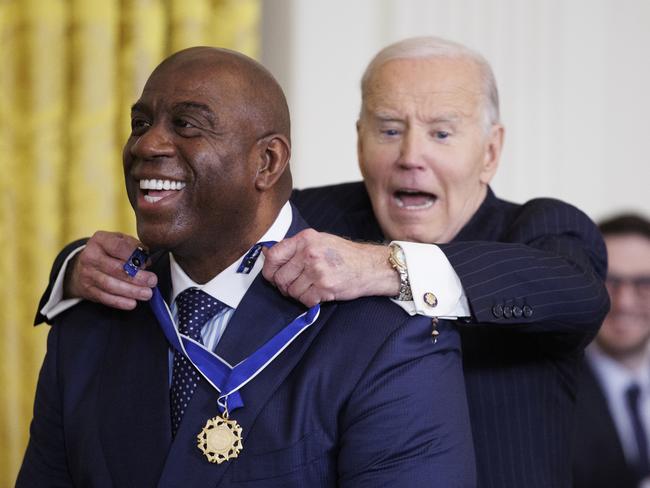 US President jokes as he honours NBA legend Earvin “Magic” Johnson. Picture: Getty Images