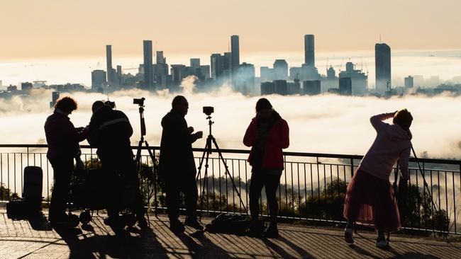 The fog made for spectacular viewing from Mt Coot-Tha early Sunday morning. Picture: Richard Walker