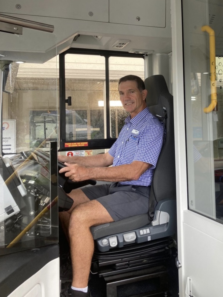 Bus driver Dan Stains behind the wheel