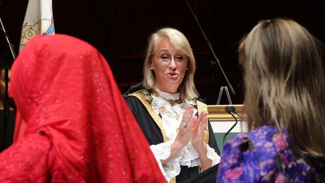 Lord Mayor Sally Capp delivers the pledge allegiance to new Australians. Picture: David Caird