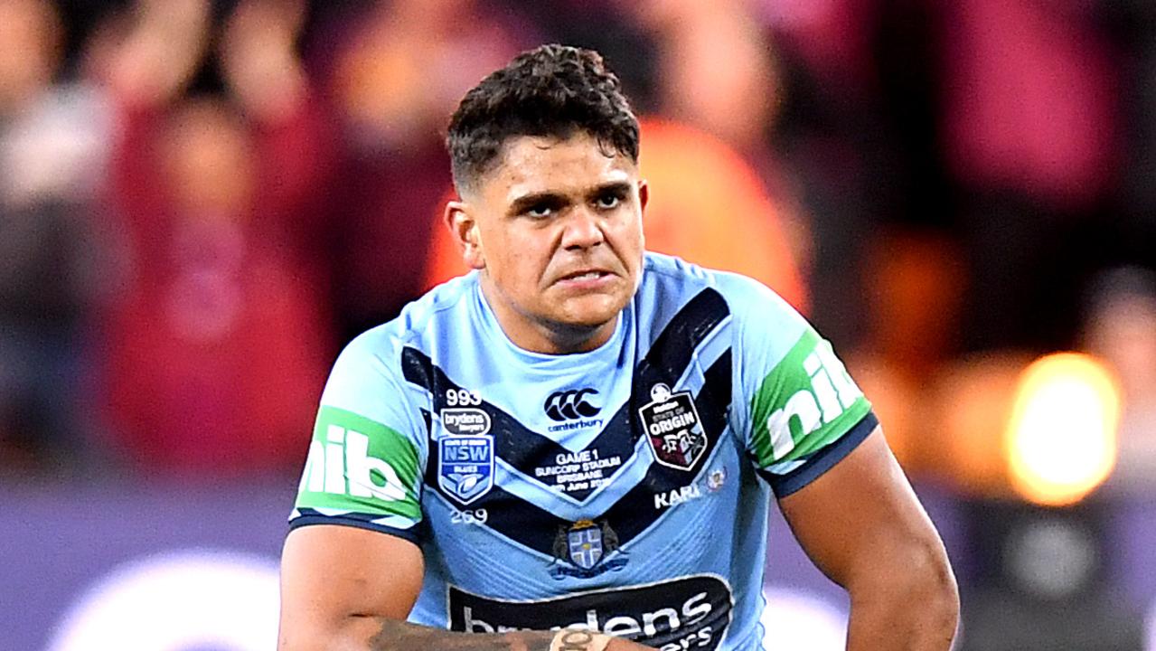 Latrell Mitchell of the Blues is dejected after his team loses game one of the 2019 State of Origin series