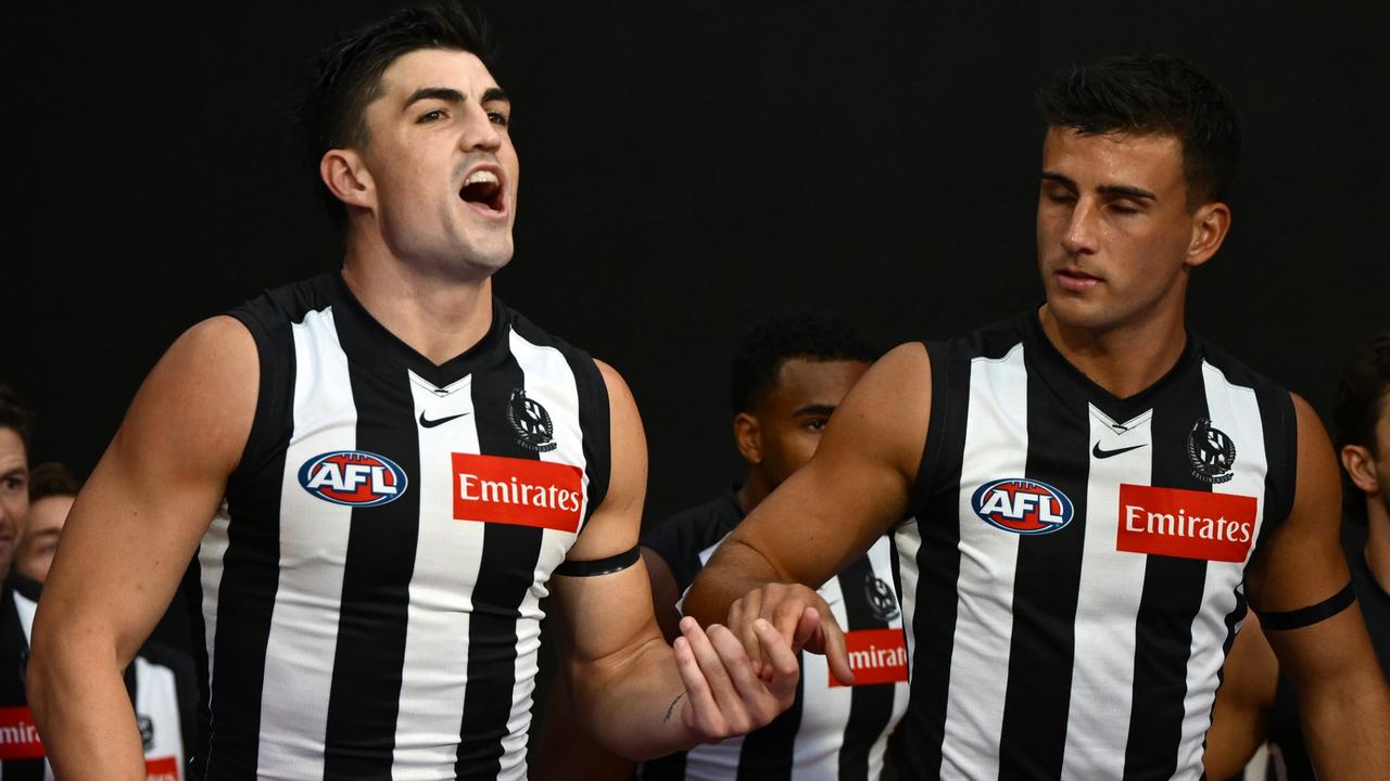 MELBOURNE, AUSTRALIA - MARCH 15: Brayden Maynard and Nick Daicos of the Magpies walk out onto the field during the round one AFL match between Collingwood Magpies and Port Adelaide Power at Melbourne Cricket Ground, on March 15, 2025, in Melbourne, Australia. (Photo by Quinn Rooney/Getty Images)