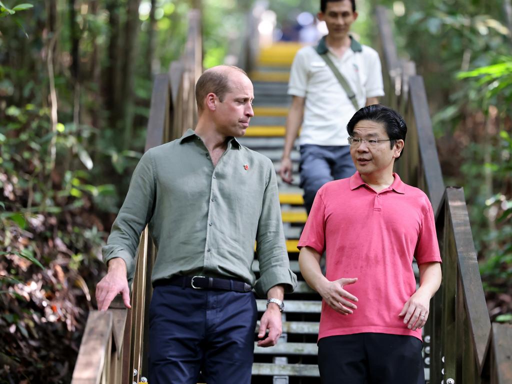 Prince William and Deputy Prime Minister and Minister for Finance, Lawrence Wong walk along a trail at the Treetop Walk in Singapore. Picture: Getty Images