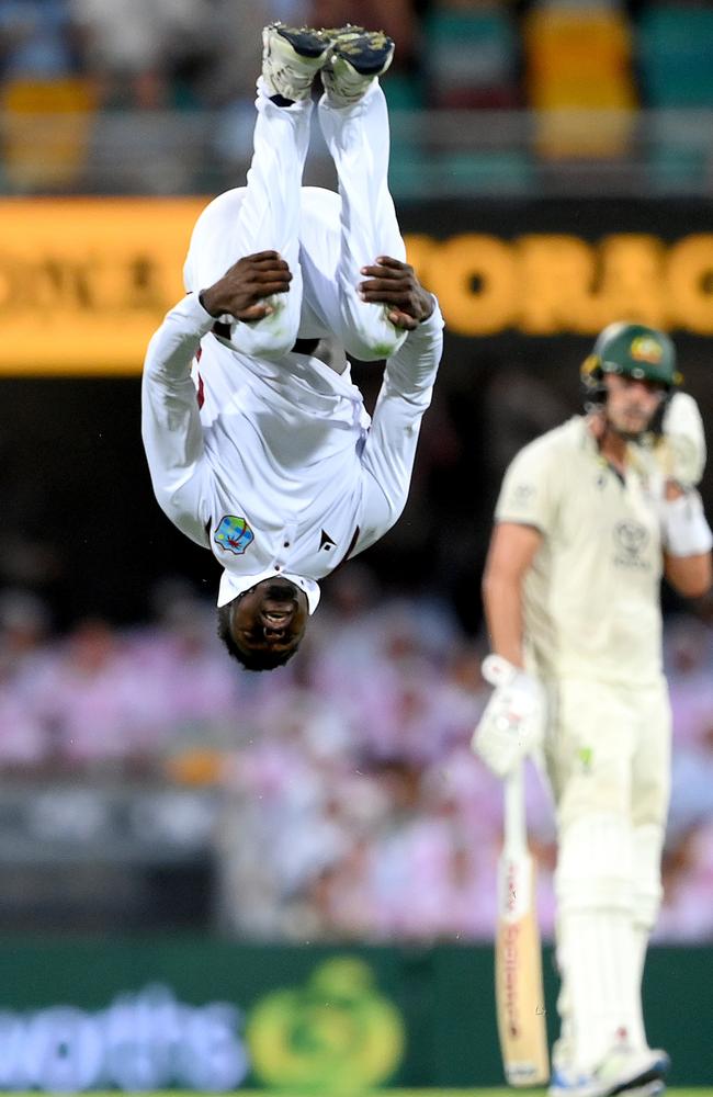 Kevin Sinclair celebrates his first Test wicket with a backflip. Picture: Bradley Kanaris/Getty Images)