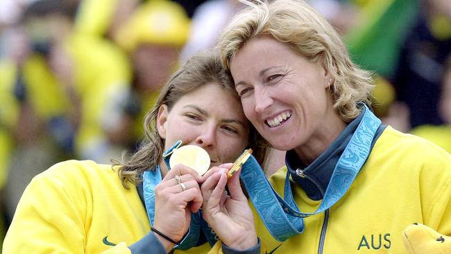 Natalie cook and Kerri Pottharst with their Sydney 2000 gold medals. Picture: John Feder